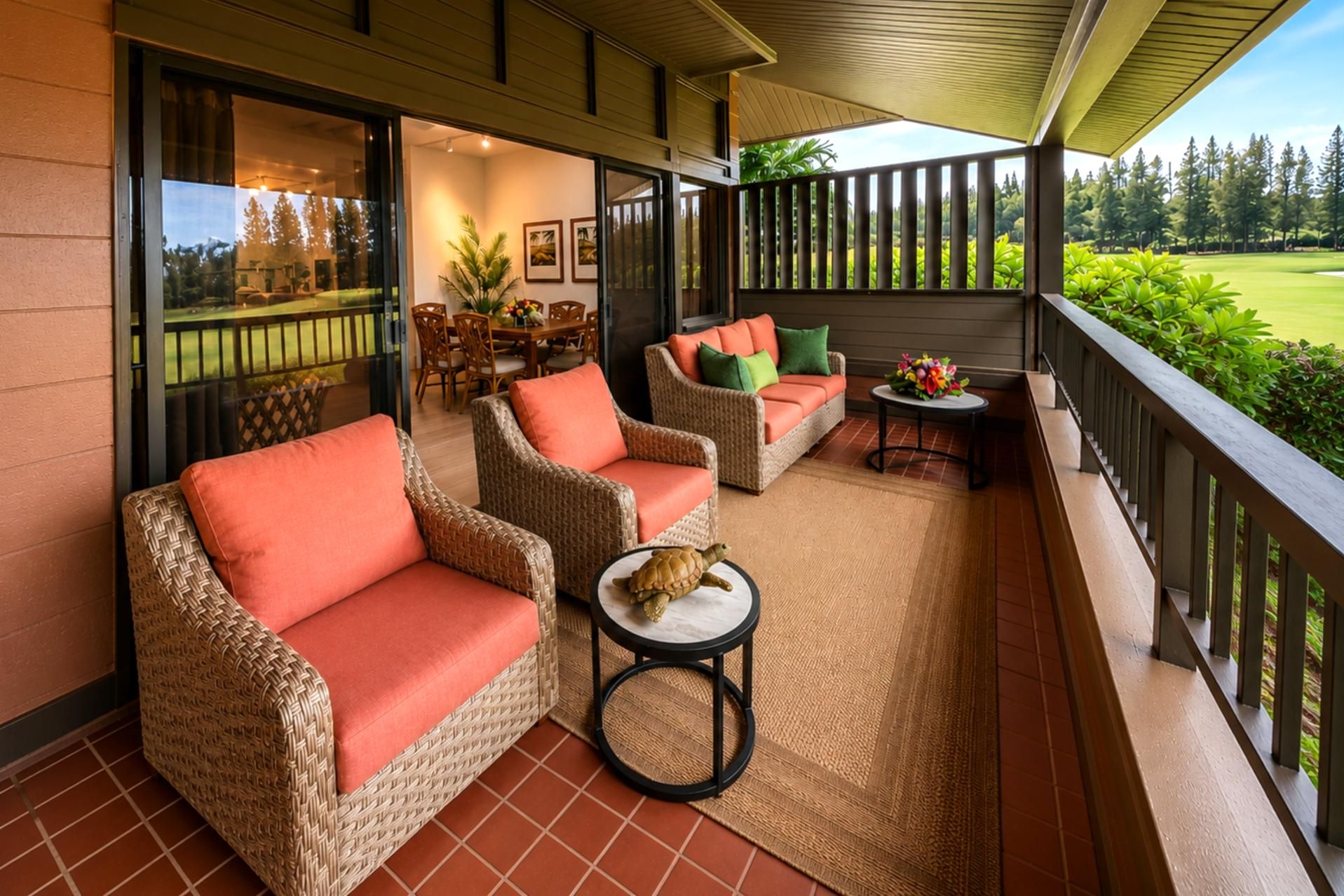 Covered lanai lounge seating overlooking the golf course