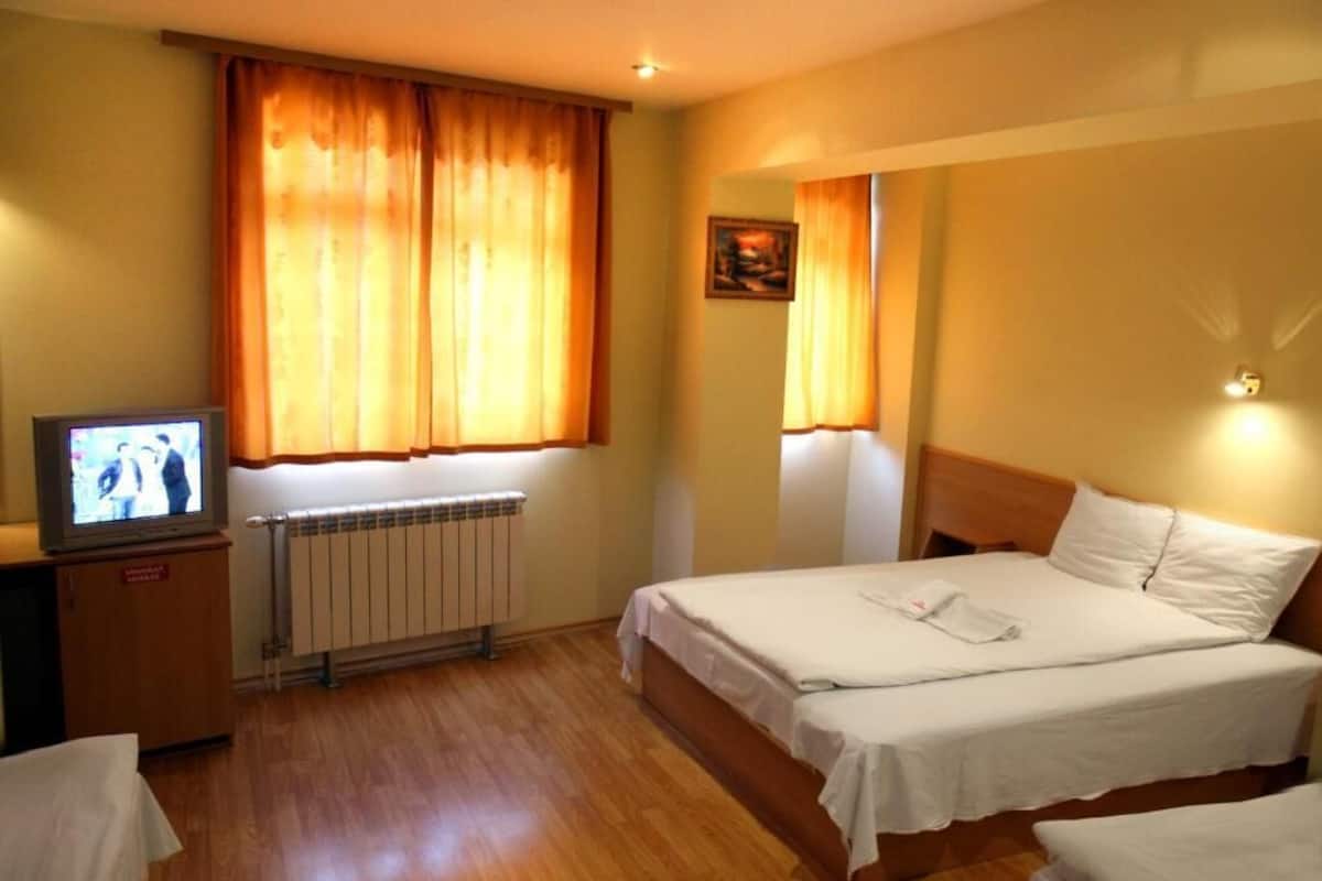 Classic Quadruple Room, City View | Desk, laptop workspace, WiFi (free)