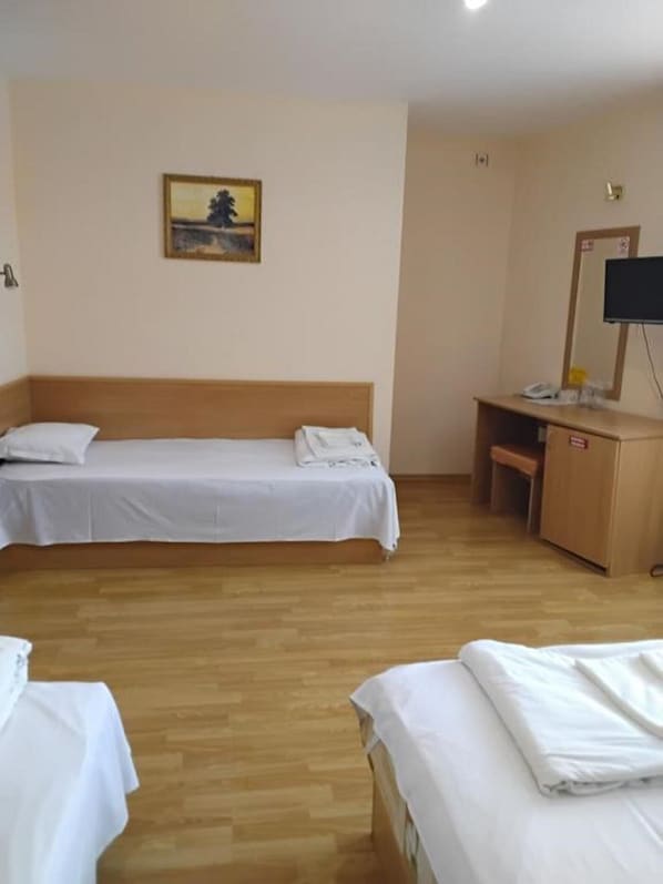 Classic Quadruple Room, City View | Desk, laptop workspace, WiFi (free)