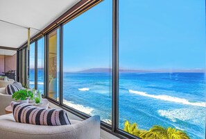 A cozy seating corner lets you sip your morning coffee and watch the waves, without ever leaving the living area. MAH-1006 - Mahana | 3 Oceanfront Villas, Sleeps 10 | Car Incl. w/ 6+ Nights | ML-4214 by KBM (Lahaina)