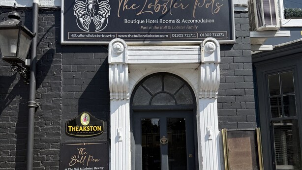 A building with a sign for 'The Lobster Pot' indicating it is a boutique hotel. - The Lobster Pots - Bawtry (Bawtry)
