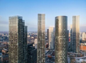 A cityscape with modern high-rise buildings. - 34th Floor CityView Apartment Manchester Deansgate (Manchester)