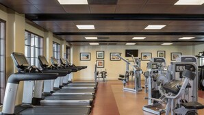A gym with treadmills, weight machines, and exercise equipment. - 1 Bedroom Villa at Lakeshore Reserve w/ Amenities (Orlando)