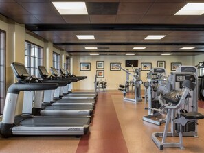 A gym with treadmills, weight machines, and exercise equipment. - 1 Bedroom Villa at Lakeshore Reserve w/ Amenities (Orlando)
