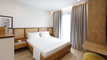 Deluxe Suite, Balcony, Sea View | WiFi (free), bed sheets