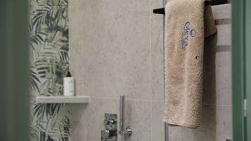 Shower, towels, toilet paper