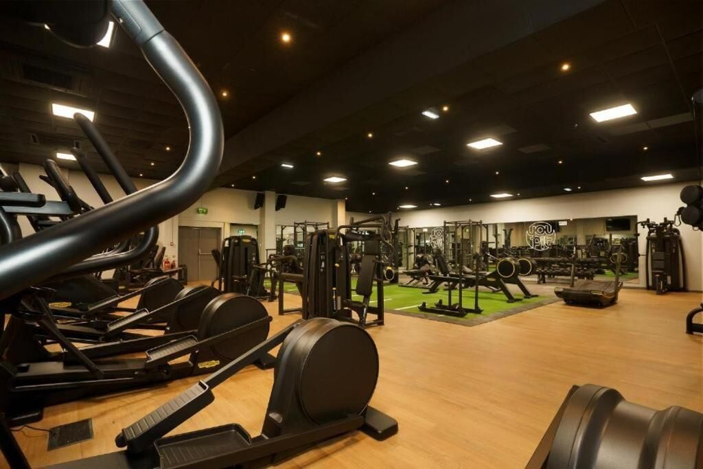 Family Studio, 1 King Bed with Sofa bed, Pool Access, Garden View | Fitness facility
