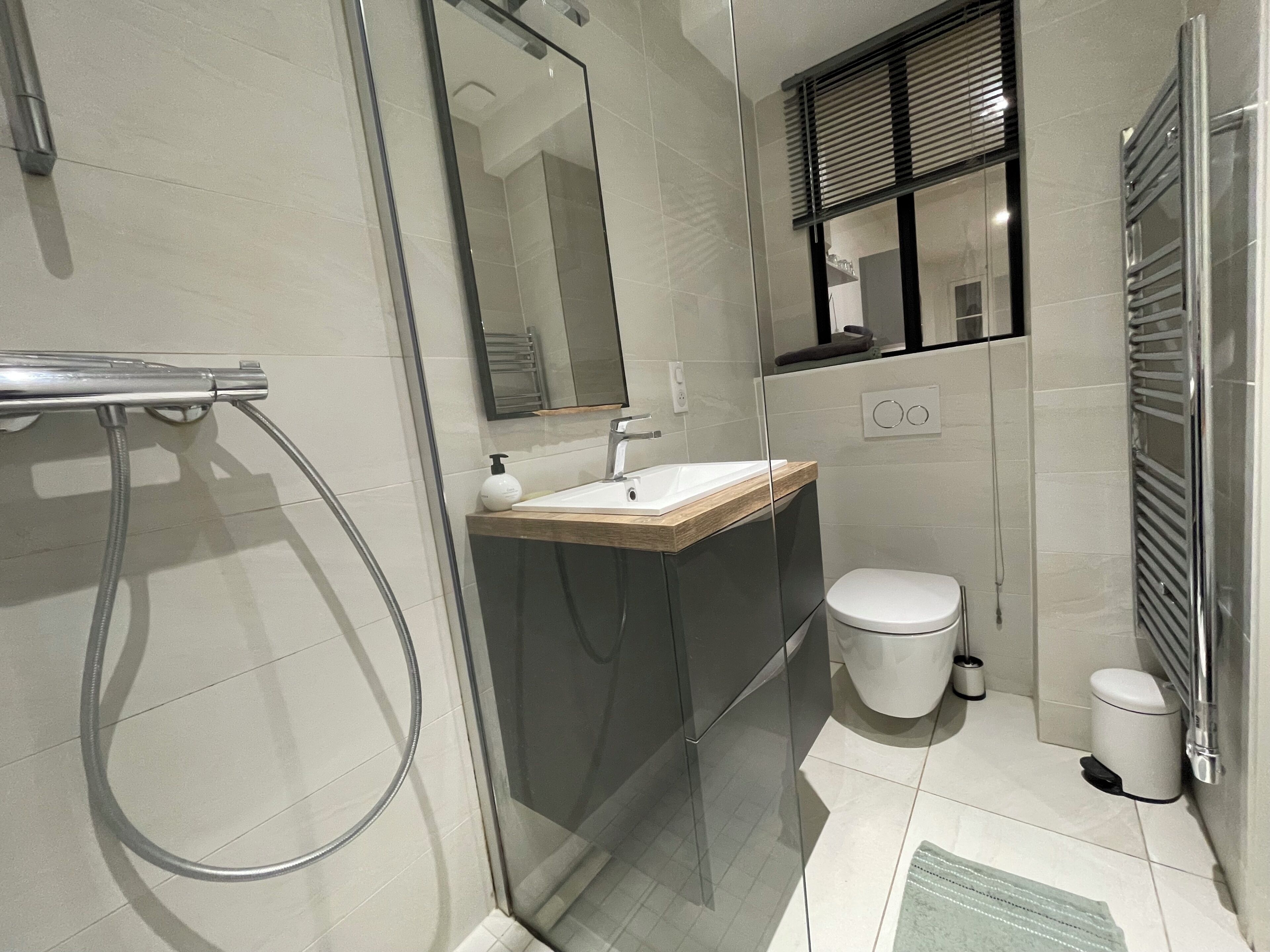 Shower, hair dryer, towels, soap