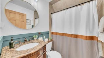 Hair dryer, towels, soap, toilet paper