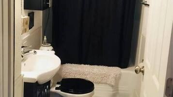 Hair dryer, towels, soap, shampoo