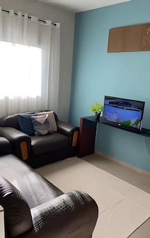Casa família, vista para o jardim | Área de estar