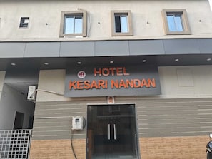 A hotel sign with the name 'Hotel Kesari Nandan' above the entrance. - Hotel Shree Kesari Nandan (Dwarka)