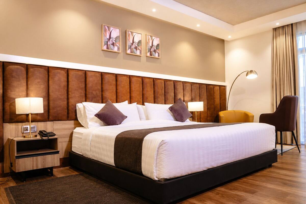 Suite, Garden View | In-room safe, desk, laptop workspace, iron/ironing board (on request)