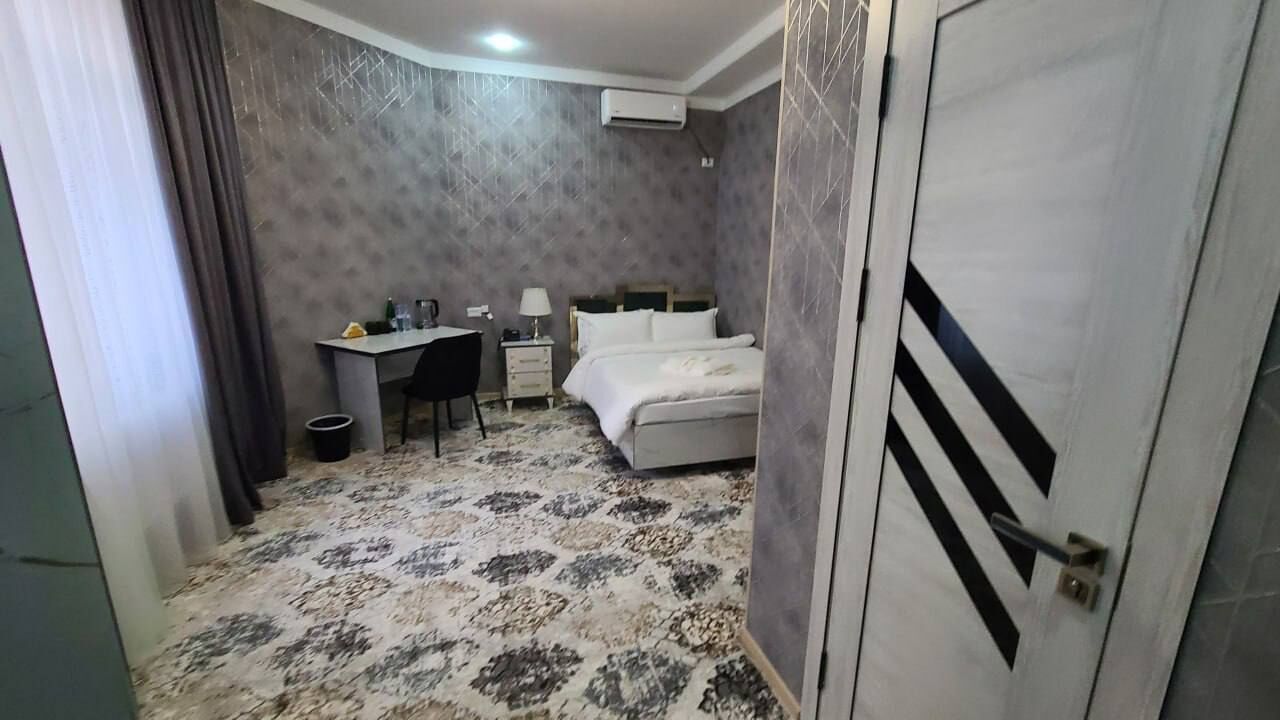 Desk, laptop workspace, blackout curtains, free WiFi
