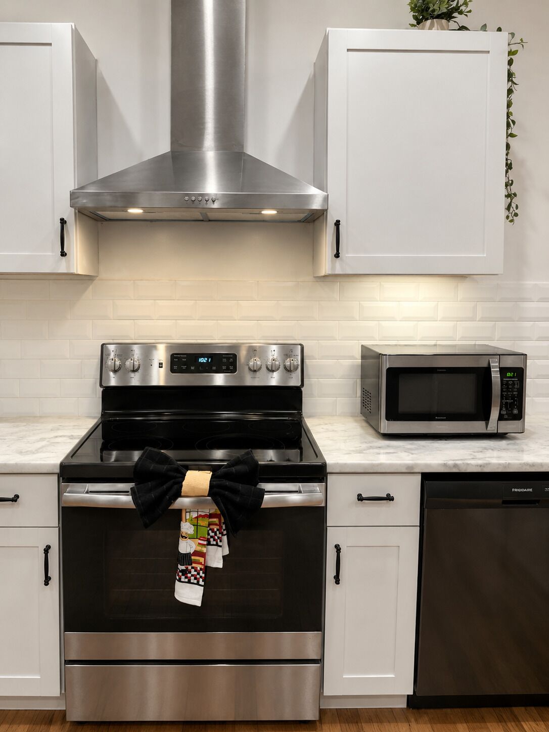 Coffee/tea maker, fridge, microwave, oven