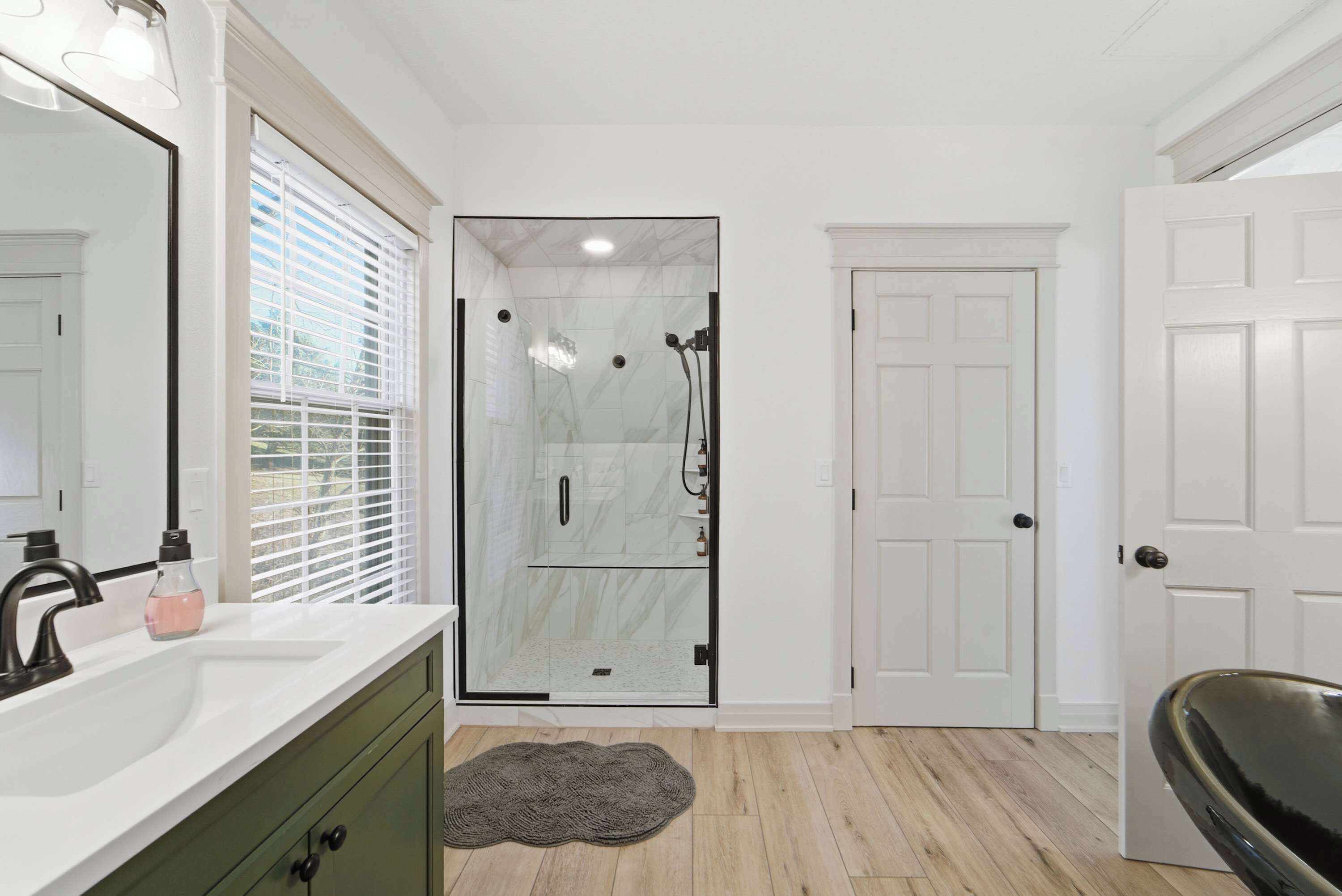 Shower, hair dryer, towels, shampoo