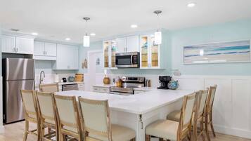 Coffee/tea maker, fridge, microwave, oven