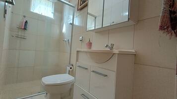 Shower, towels, soap, toilet paper