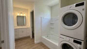 Hair dryer, towels, soap, toilet paper