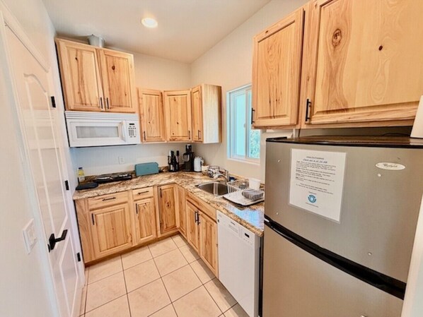 Coffee/tea maker, fridge, microwave, dishwasher