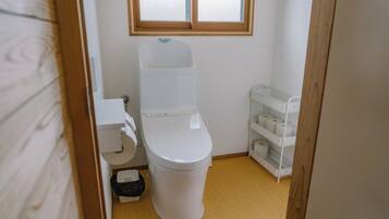 Hair dryer, bidet, towels, soap