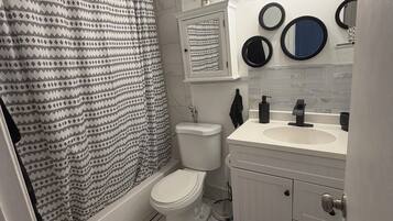 Hair dryer, bidet, towels, soap