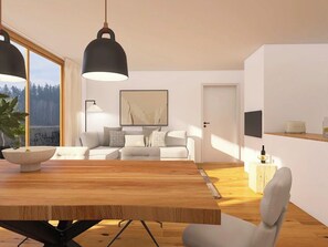Ein modernes Wohnzimmer mit einem Holzespeisetisch, einer Sofagarnitur und einem großen Fenster mit Blick ins Freie.