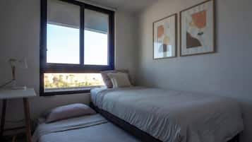 2 habitaciones, tabla de planchar con plancha, wifi y ropa de cama