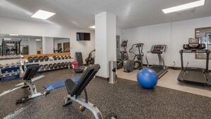 A gym with treadmills, elliptical machines, and free weights. - Mountain View Ski-In/Out Palisades Condo Hot-Tub (Olympic Valley)