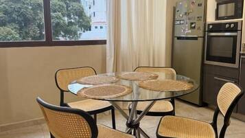 Standard Apartment, Balcony, City View | Dining