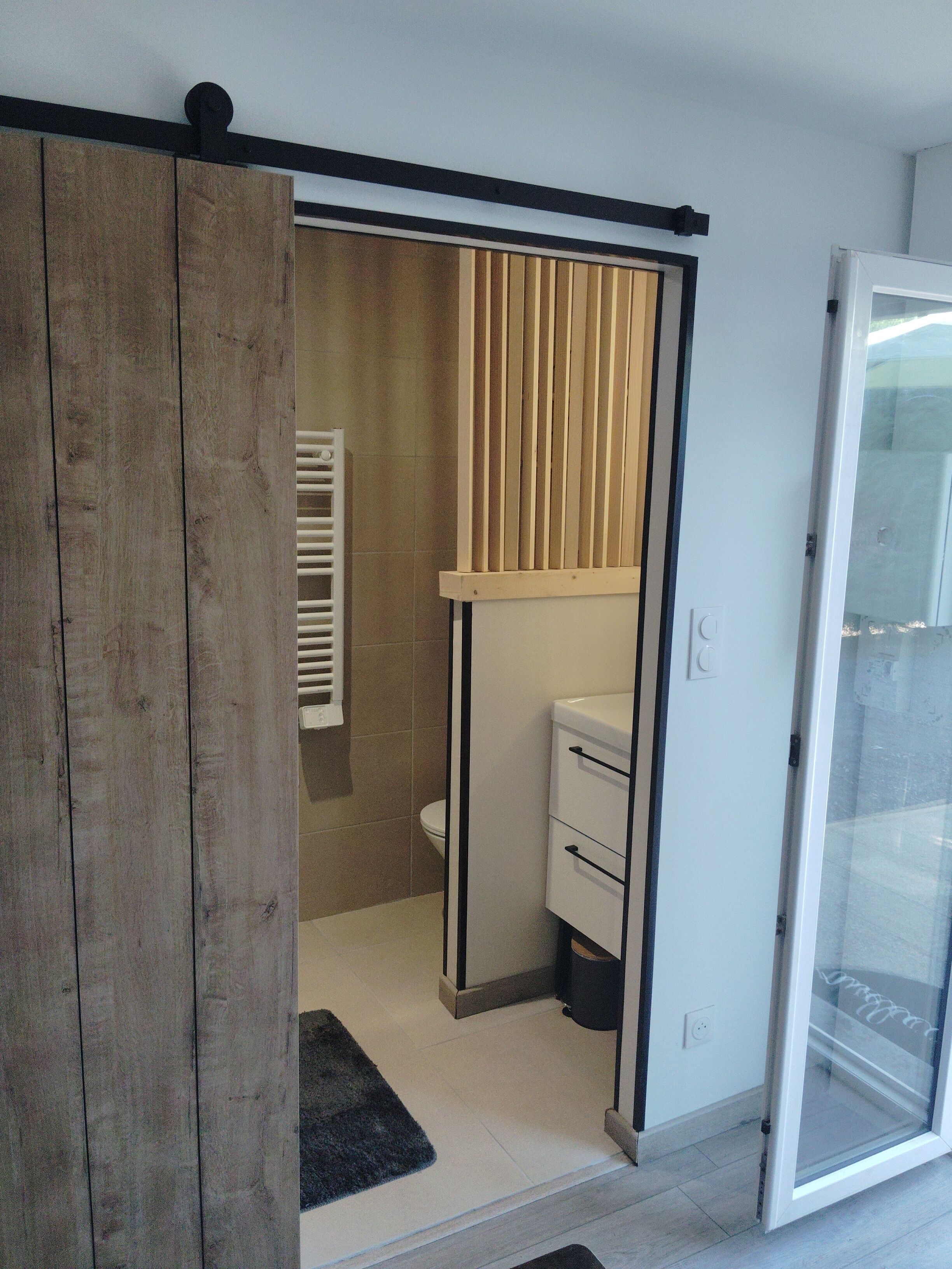 Shower, towels, toilet paper