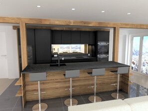 A modern kitchen with a central island, black cabinets, and stainless steel appliances. - Alphubel Peak & Unlimited by Interhome (Saas-Fee)