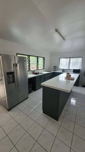 Coffee/tea maker, fridge, microwave, oven