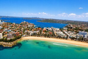 On the beach - 
Wake up by the sea premium Manly Beach retreat for two the sand just steps away (Manly)