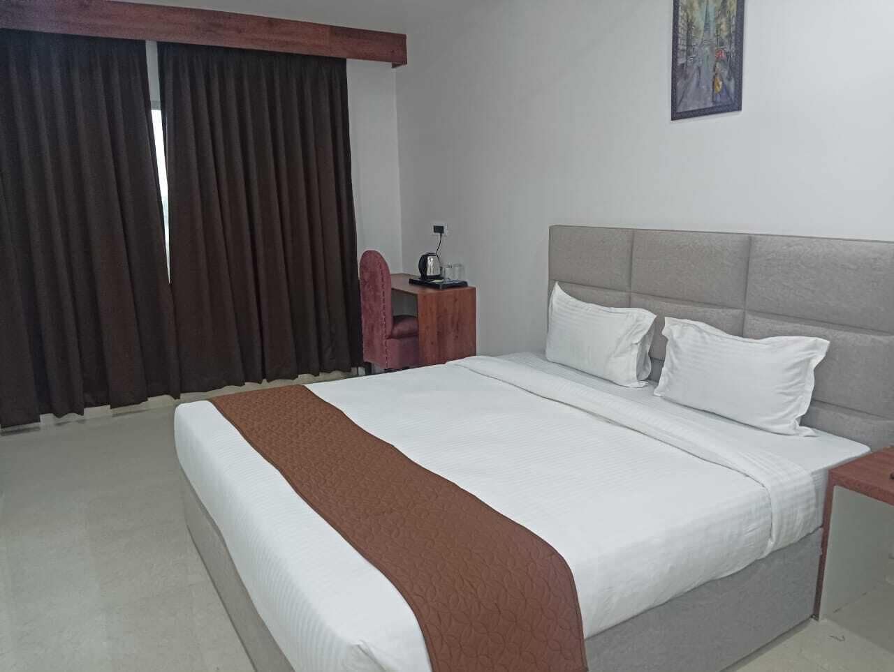 Deluxe Double Room, City View | In-room safe, desk, laptop workspace, iron/ironing board (on request)
