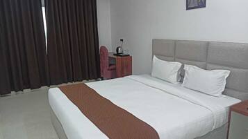 Deluxe Double Room, City View | In-room safe, desk, laptop workspace, iron/ironing board (on request)
