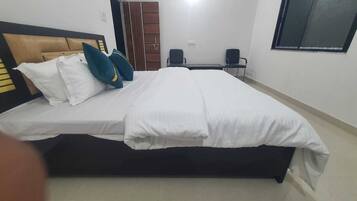Chambre Deluxe double | Literie fournie
