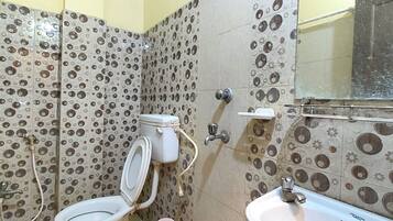 Double Room | Bathroom | Shower, slippers, soap, shampoo