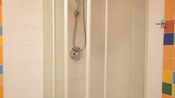 Double Room, City View | Bathroom | Bathtub, slippers, towels, soap