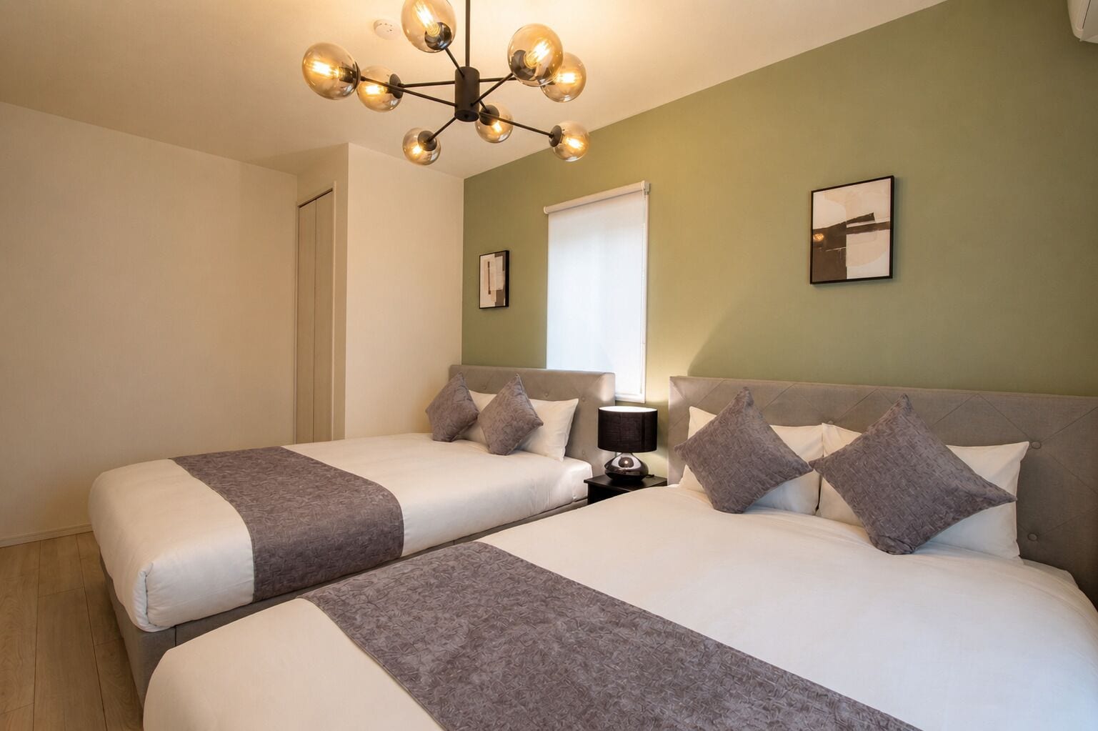 Premium bedding, blackout curtains, iron/ironing board