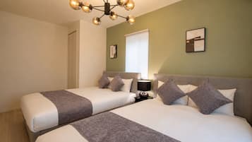 Premium bedding, blackout curtains, iron/ironing board