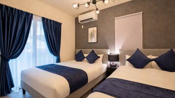 Premium bedding, blackout curtains, iron/ironing board