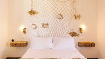 Apartment, 1 Queen Bed with Sofa bed, Pool Access, Courtyard View | Blackout curtains, iron/ironing board (on request), cots/infant beds