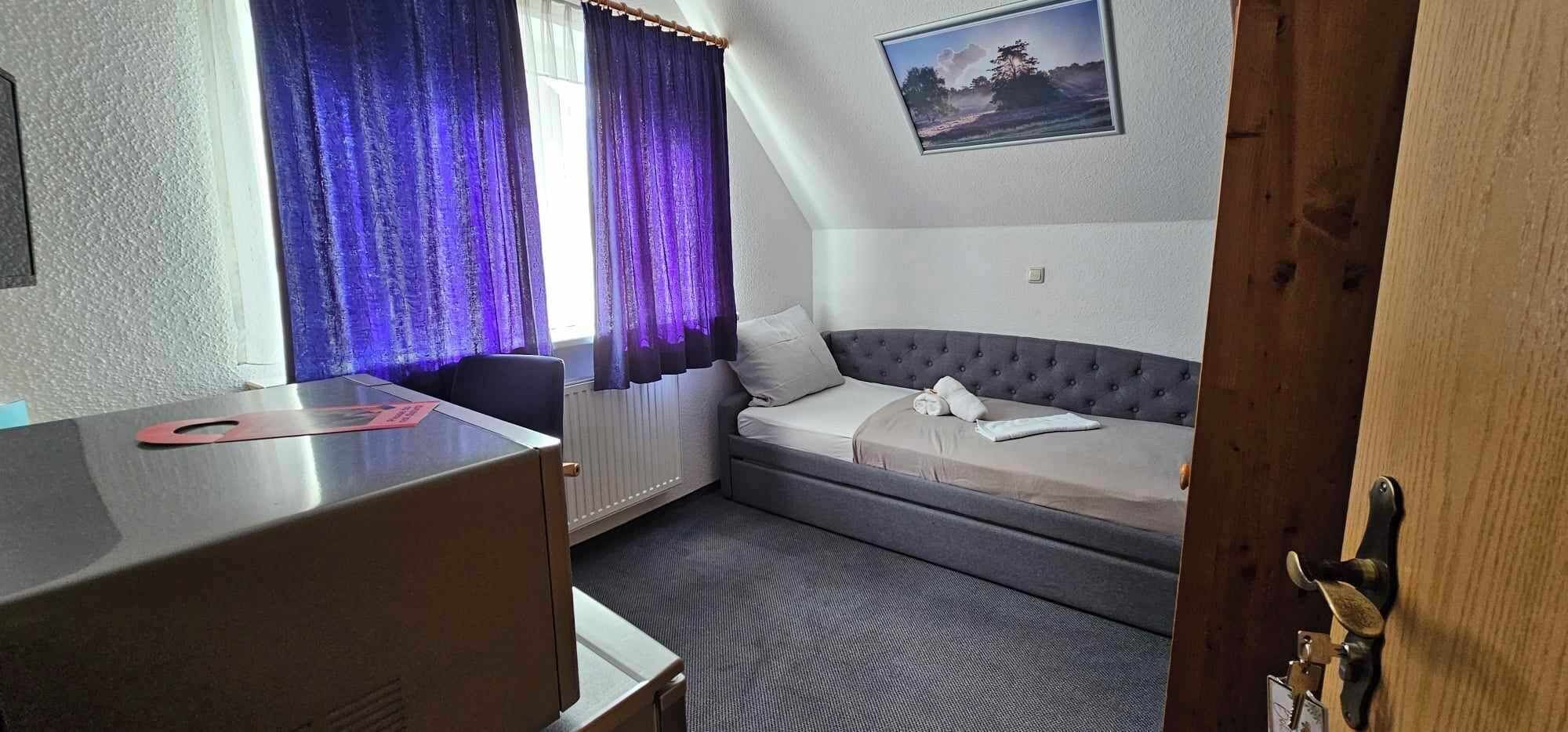 Desk, laptop workspace, blackout curtains, free WiFi