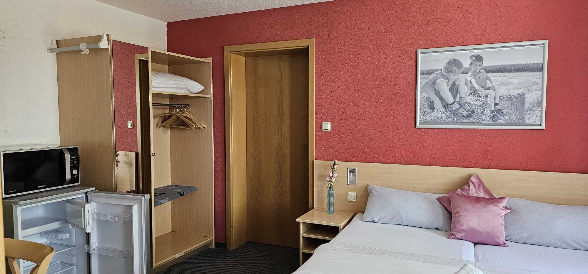 Family Quadruple Room | Desk, laptop workspace, blackout curtains, cots/infant beds