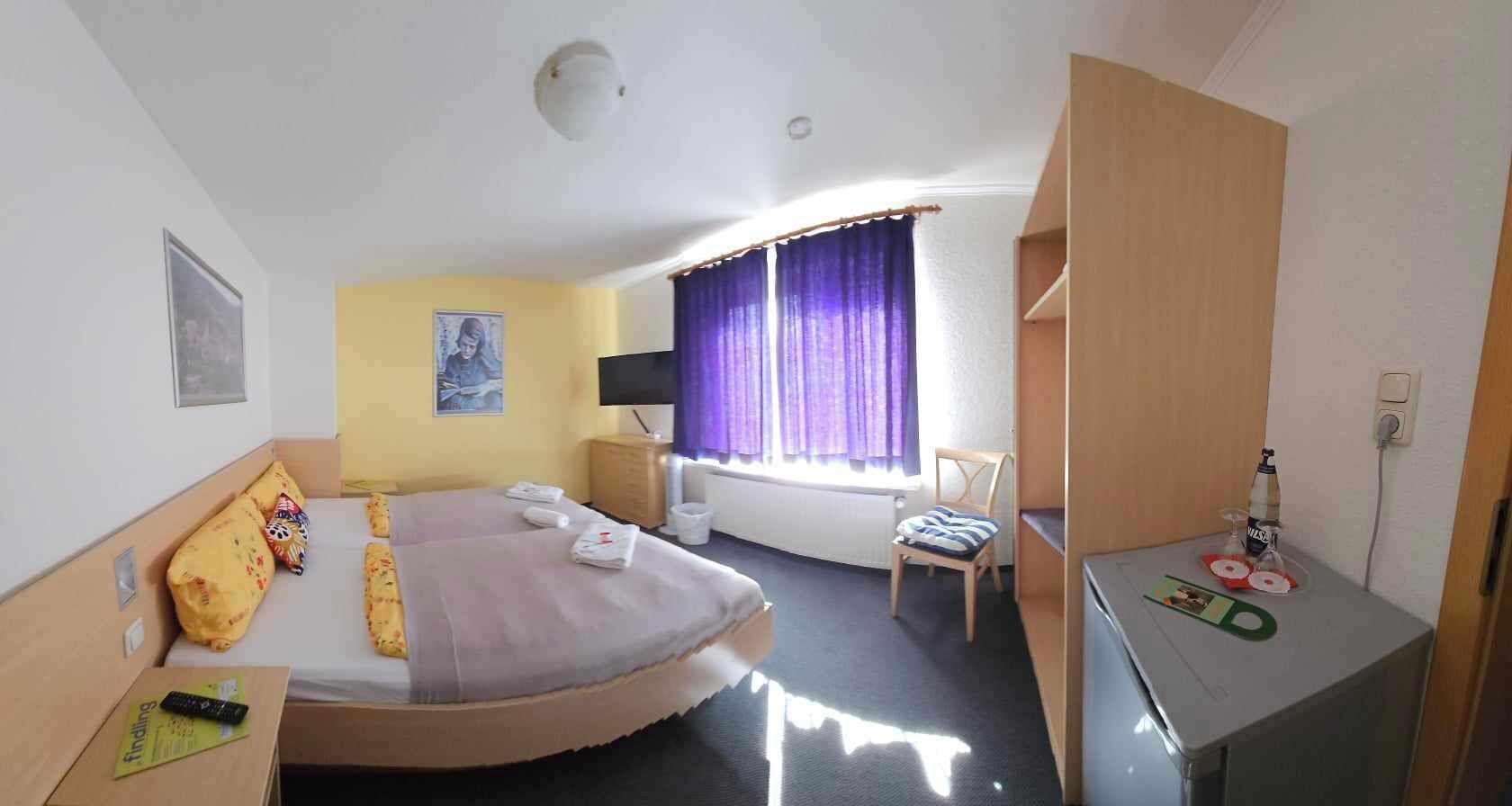 Family Triple Room | Desk, laptop workspace, blackout curtains, cots/infant beds