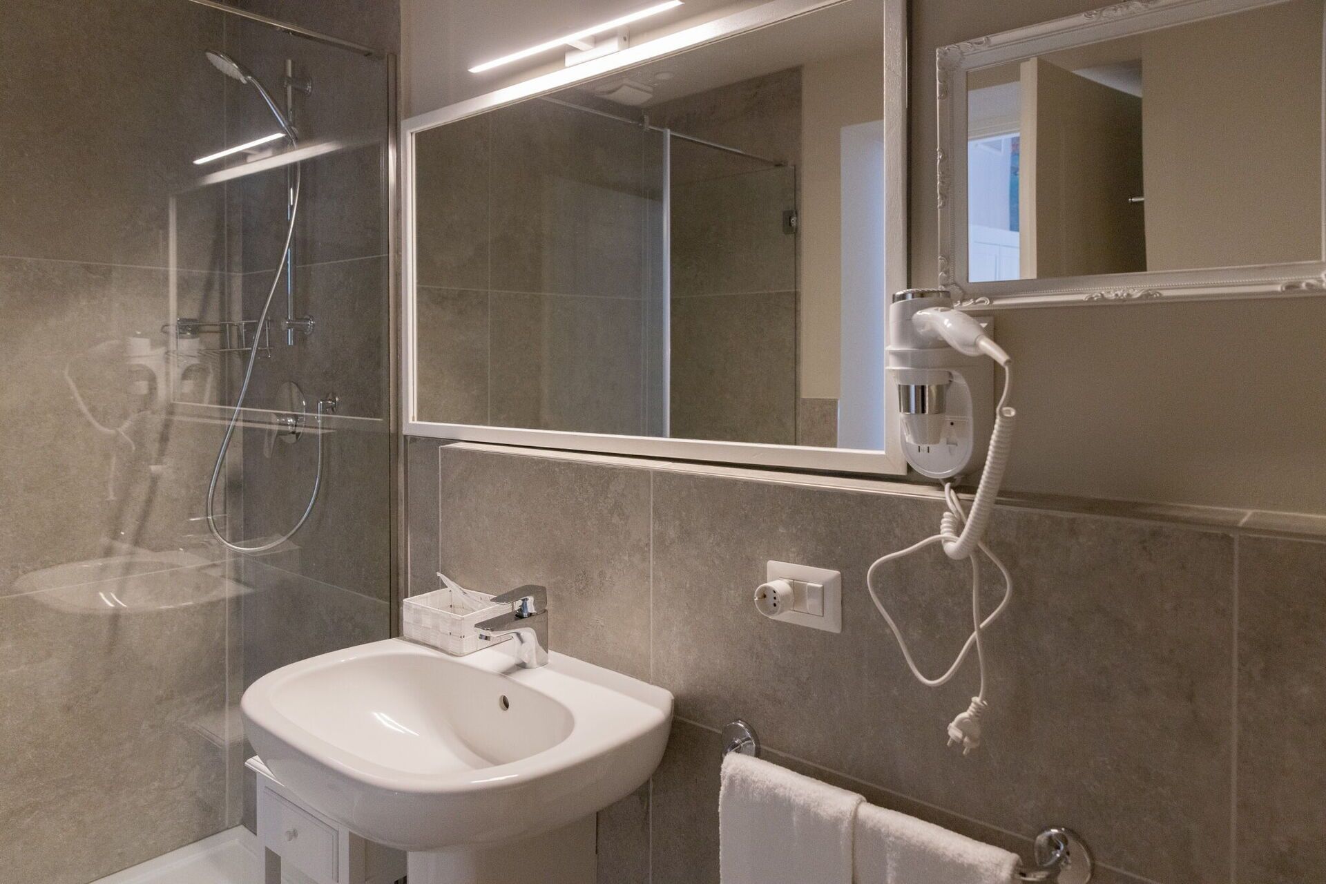 Shower, jetted tub, hair dryer, bidet