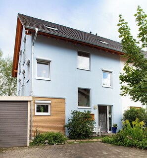 A two-story residential building with a flat roof, multiple windows, and a front door. - Vacation Home in Creutzig on Lake Constance - Families, Friends & Relaxation, 8–10 People (Stockach)