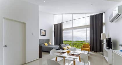 High Ceiling Oceanview Studio | Pool & Beach