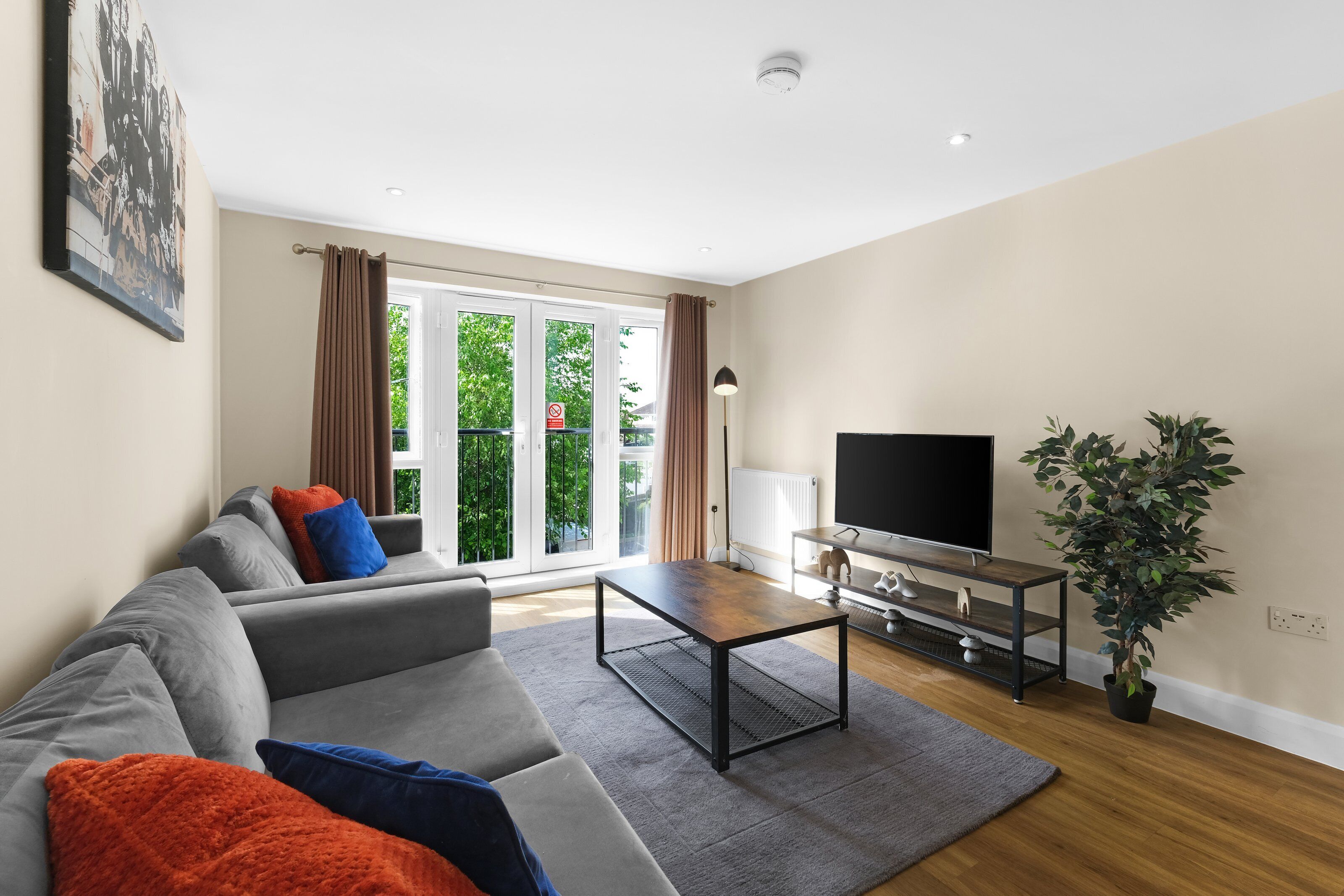 Basic Apartment, Balcony | Living area | 42-inch Smart TV with digital channels, Netflix, streaming services